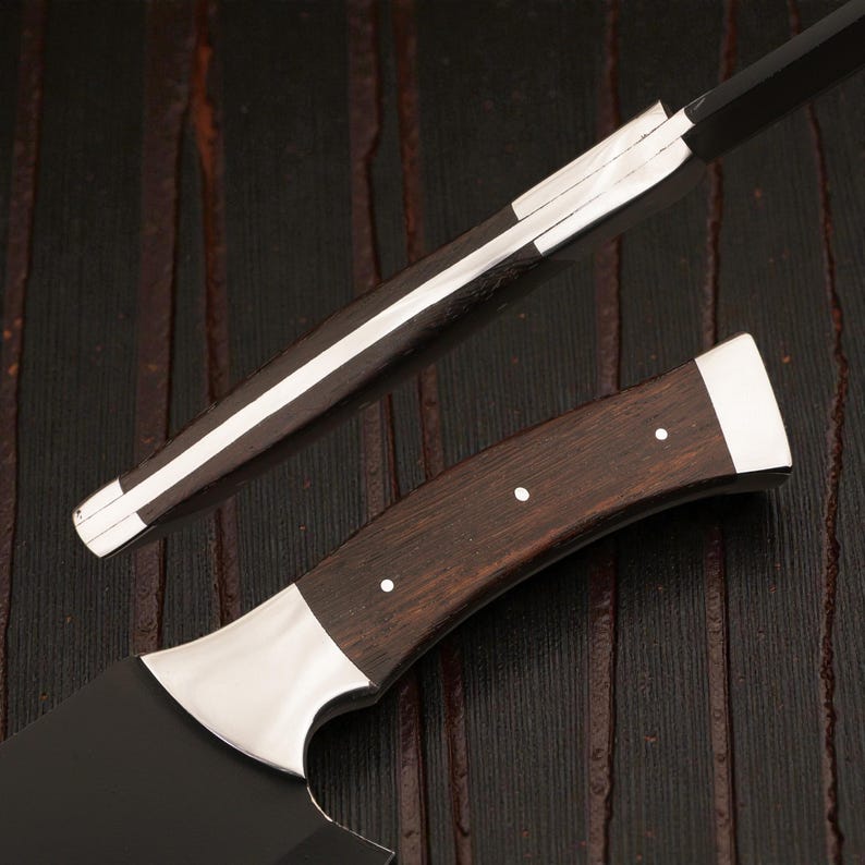 Close-up of the survival knife set's 440C stainless steel blade
