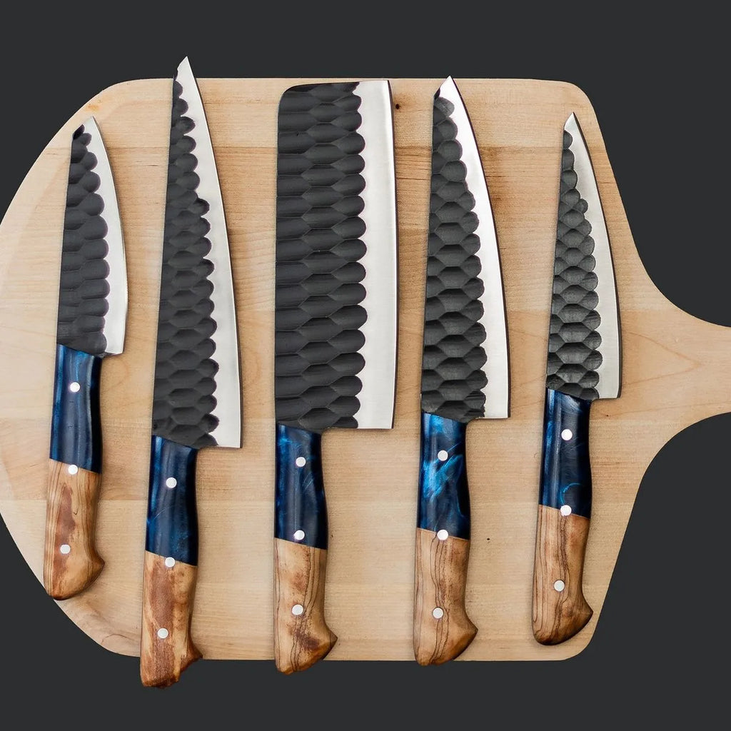 High-quality forged culinary knife collection showcasing superior craftsmanship and modern artistic design.