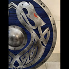 Handcrafted blue Viking dragon shield, angled display shot