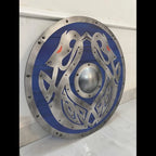 Blue Viking shield dragon knotwork carving detail