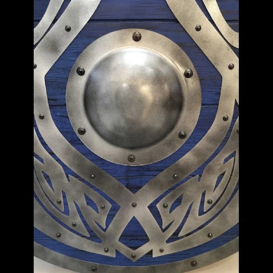 Handcrafted Viking dragon shield displayed as wall decor