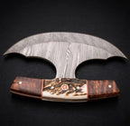 A muscular arm holding a handcrafted replica of Kratos' Leviathan axe raised against a dark grey studio background, showcasing the large steel bearded blade with detailed runic engravings, inlaid blue glowing gems, and an intricately carved wooden handle wrapped in black leather.