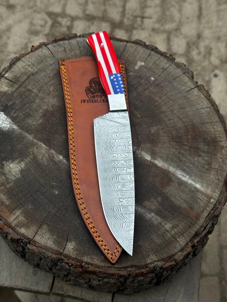 Damascus chef knife with sheath, top-down view