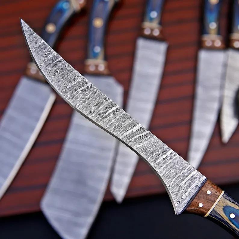 Close-up of the Damascus steel blade pattern on the chef knife set