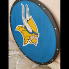 Handcrafted Viking shield displayed as wall decor