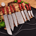 Handcrafted Damascus steel Bowie knife isolated on a clean white background, showcasing an intricate twist pattern blade, engraved silver guard, and dark pakkawood handle.