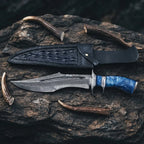 Handmade Damascus Bowie knife with a finger guard, featuring a 10-inch San Mai VG10/15N20 steel blade and a striking blue resin handle, presented with an Italian leather sheath