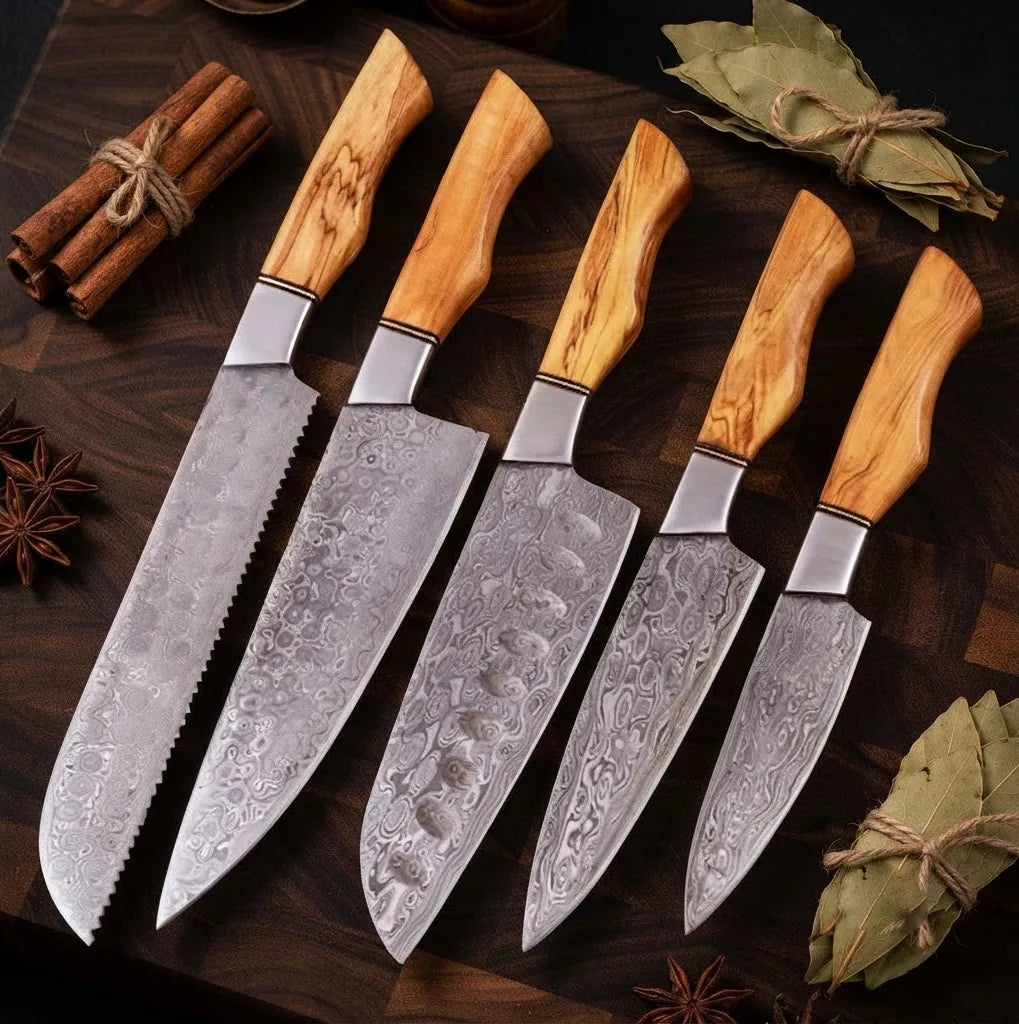 A professional 5-piece Damascus steel kitchen knife set featuring stunning natural olive wood handles, arranged elegantly with cinnamon and dried herbs.