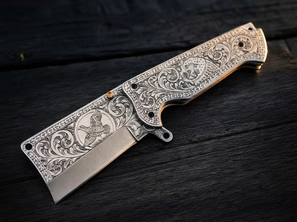 High-quality custom engraved pocket cleaver knife showcasing intricate metal relief work and a satin finish edge for collectors and gift buyers