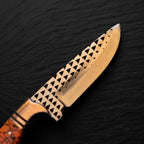 A professional close-up macro shot of a handmade Rasp Forged D2 steel skinning knife, showcasing the intricate triangular rasp teeth on the spine and polished cutting bevel