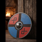 Close-up of the Nordic rune shield's carved details and metal boss