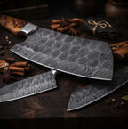 A professional-grade Damascus steel cleaver knife resting on a wooden board, surrounded by cinnamon sticks and spices, highlighting the intricate forged pattern of the blade.