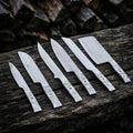 A set of six premium hand-forged kitchen knives featuring elegant marble-patterned resin handles, arranged neatly on a rustic dark wood surface.