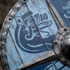 Close-up of the Viking raven shield's artwork and metal boss